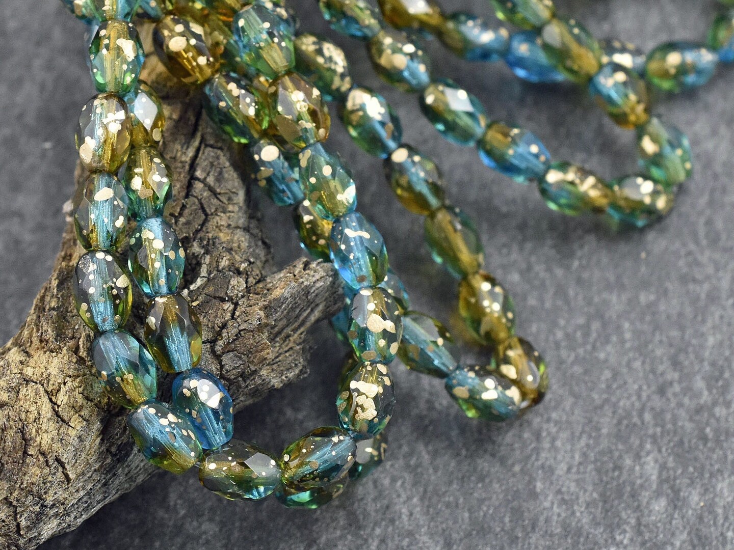 *20* 5x7mm Gold Washed Teal Topaz Fire Polished Faceted Oval Beads