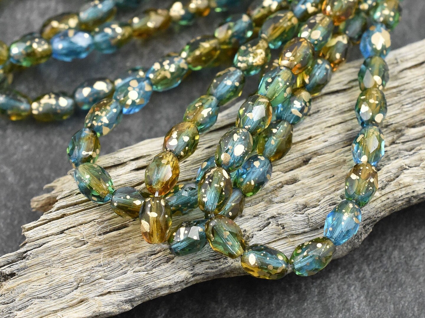 *20* 5x7mm Gold Washed Teal Topaz Fire Polished Faceted Oval Beads