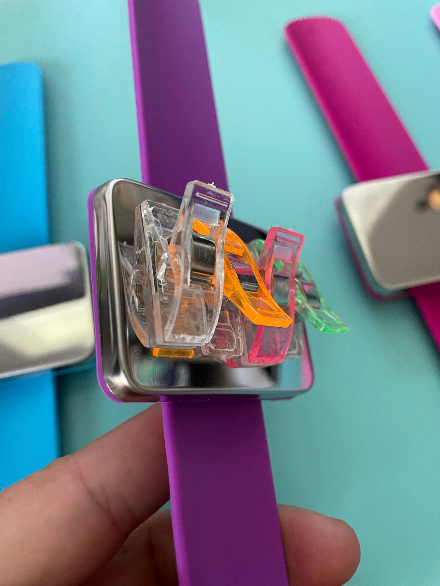 Magnetic slap bracelets