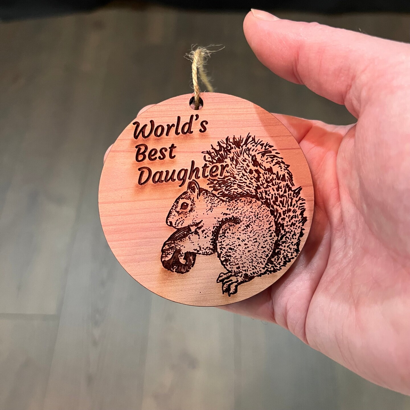 Worlds Best Daughter Squirrel and Nut - Cedar Ornament Worlds Best Daughter Squirrel and Nut - Cedar Ornament