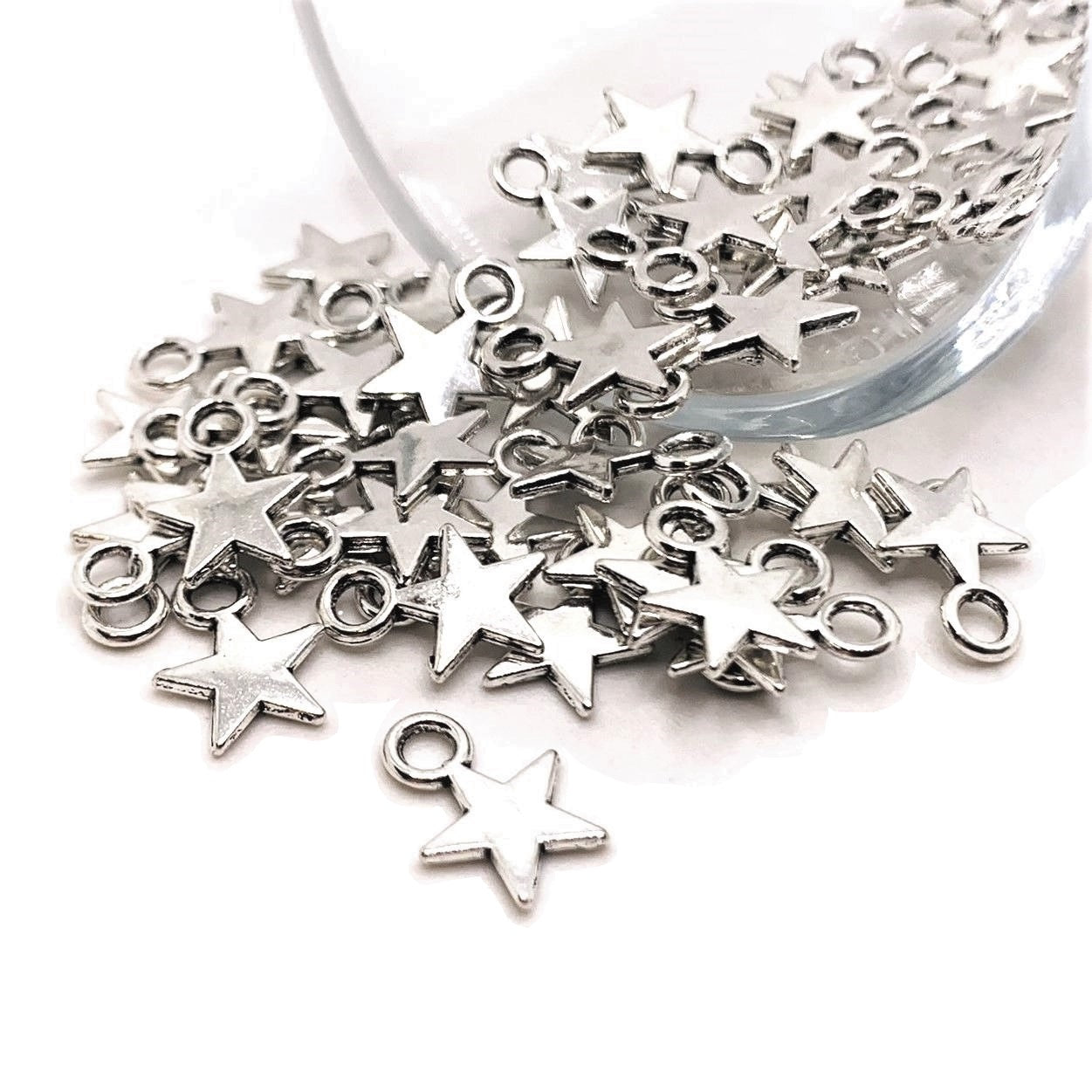 4, 20 or 50 Pieces: Small Antiqued Silver Star Charms | Michaels