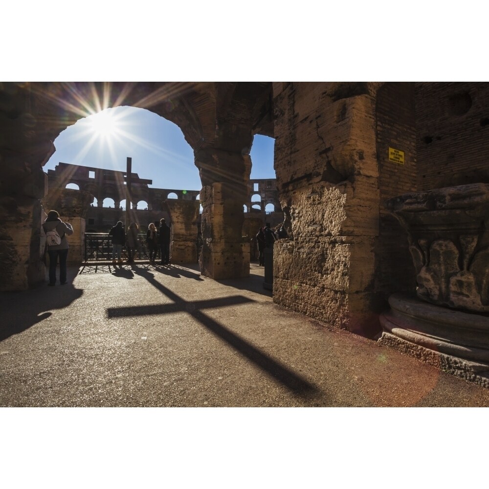 Posterazzi Sunburst through an archway at the Colosseum and a shadow of a cross; Rome  Italy Poster Print