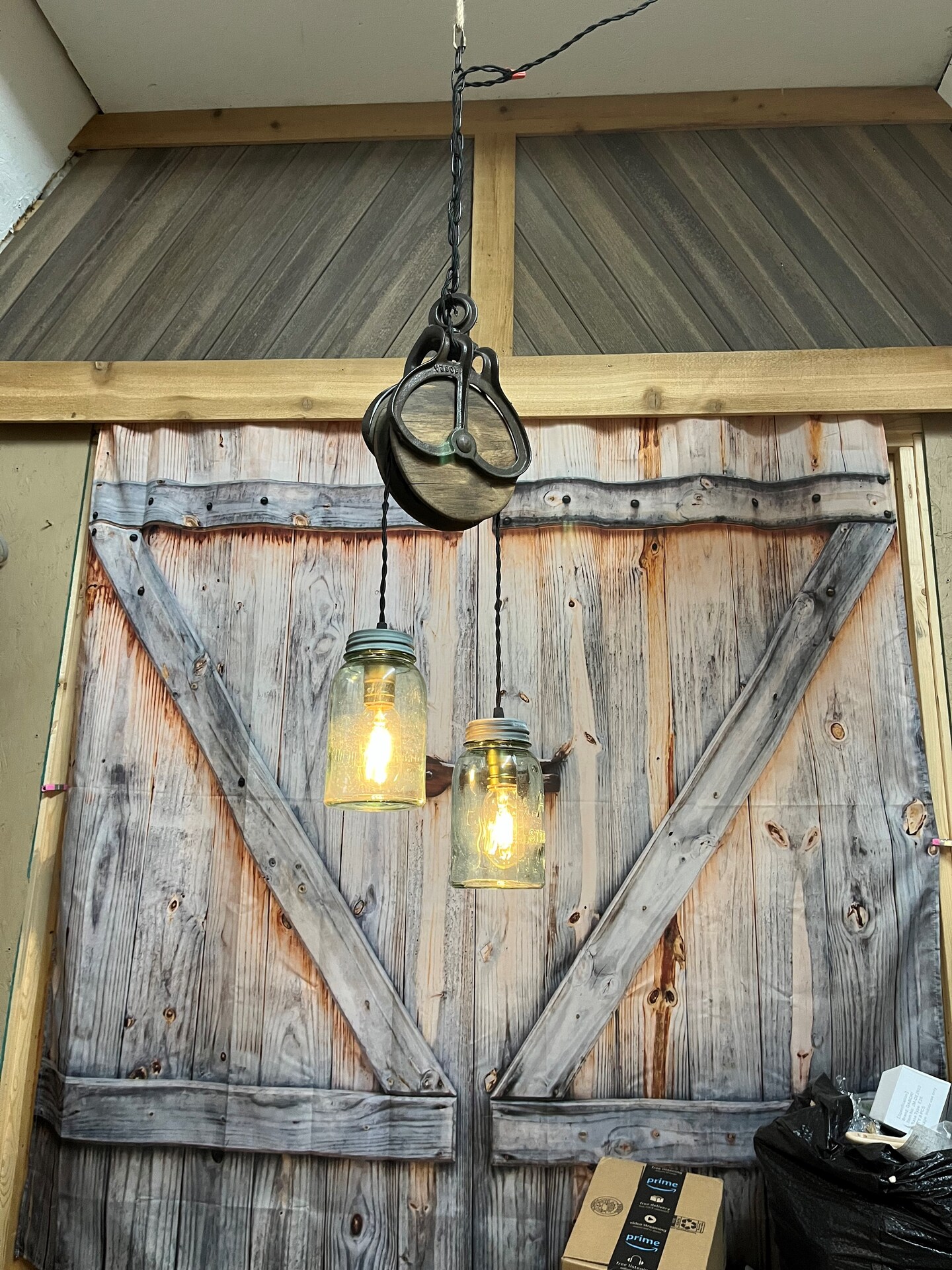 Rustic farmhouse pendant lighting, with antique farm pulley and