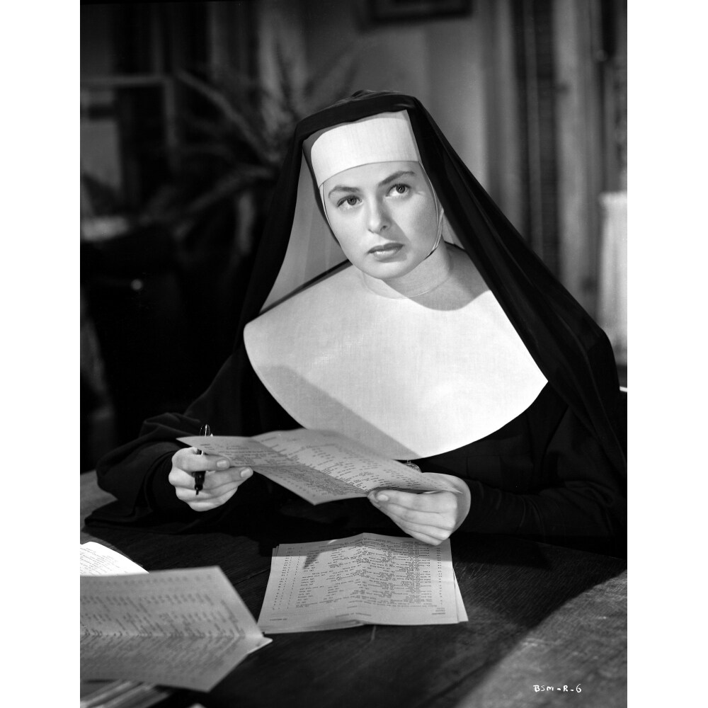Posterazzi Ingrid Bergman Reading in a Nun Attire Photo Print