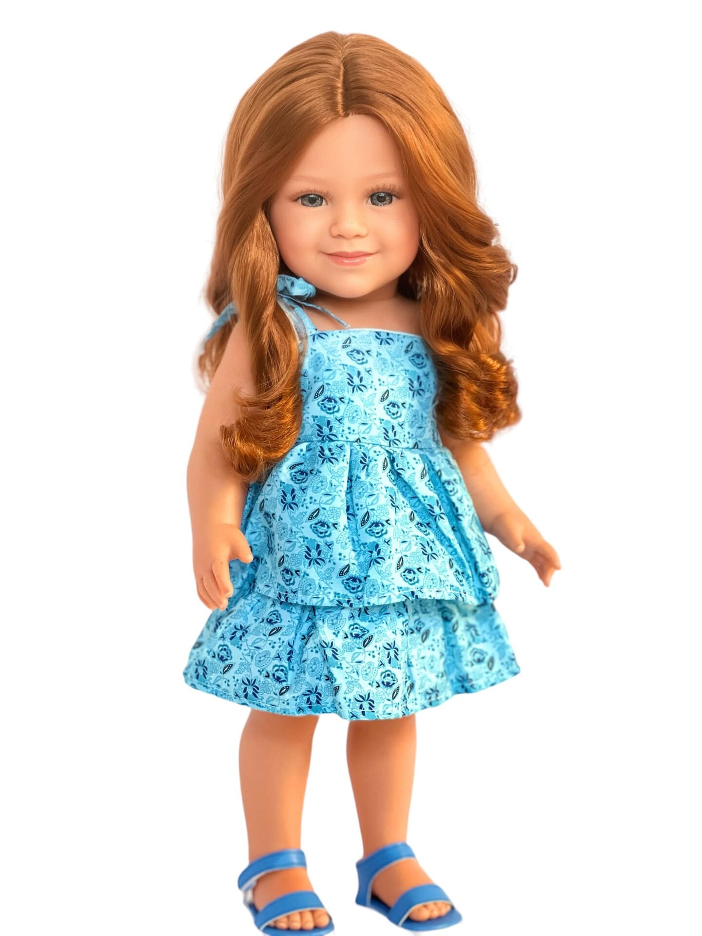 Rae Ricci&#x2122;: The Stylish Traveler with Red Curly Hair and Blue Eyes