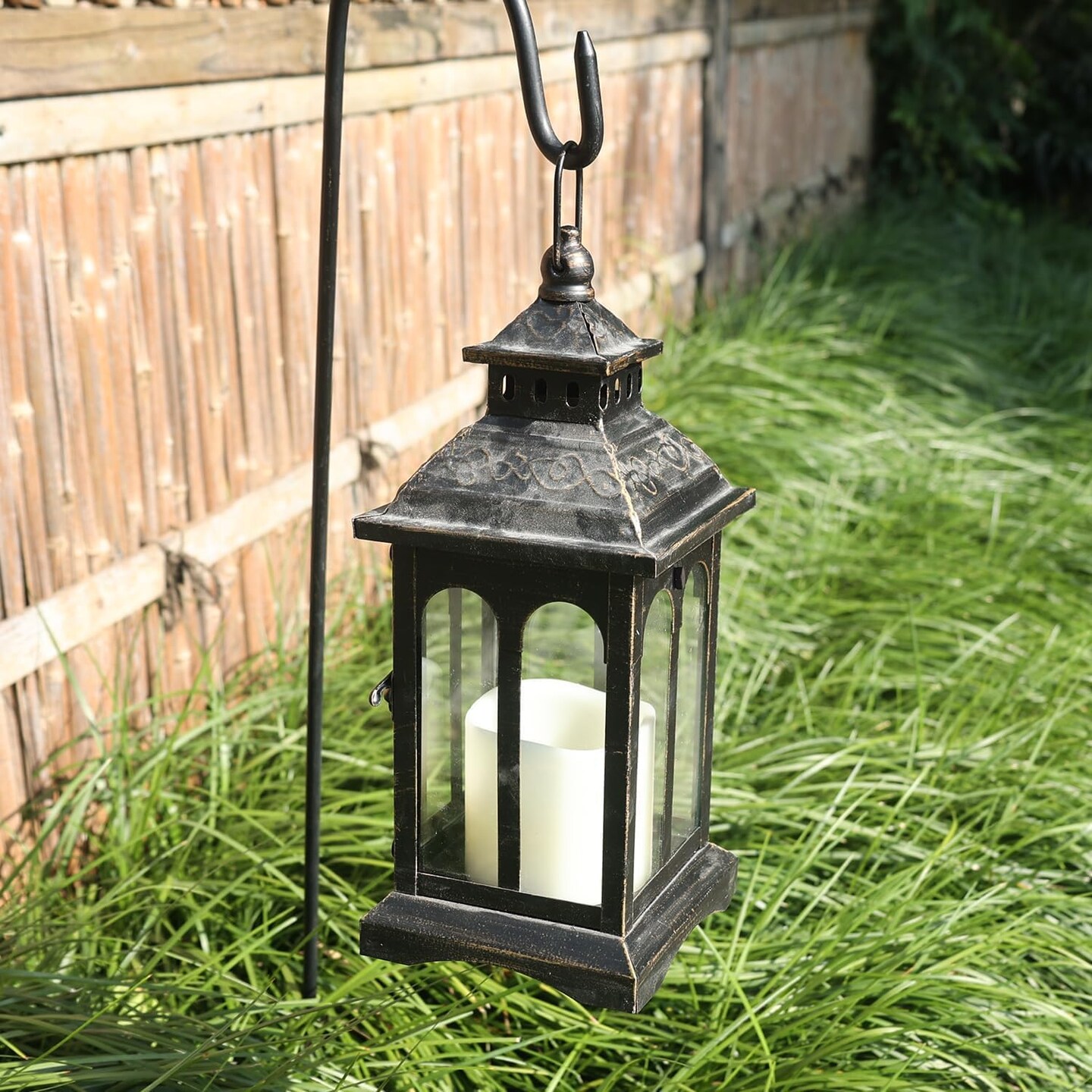 Indoor and outdoor decorative candle lanterns made of vintage metal, perfect for front porches, patios, wedding parties, and Christmas d&#xE9;cor (black with copper brush).