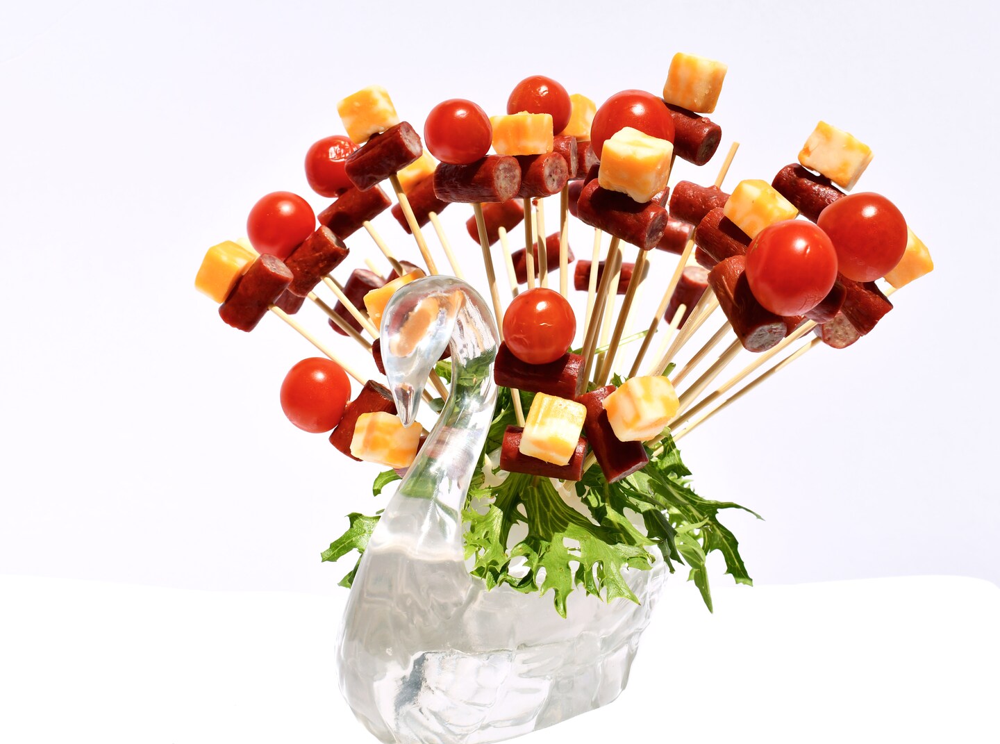 Skewer Food Server, The Elegant Swan Set Includes 100 All Natural Bamboo Skewers to display bite-sized fruits, vegetables, meats, cheese, desserts, and other appetizers.