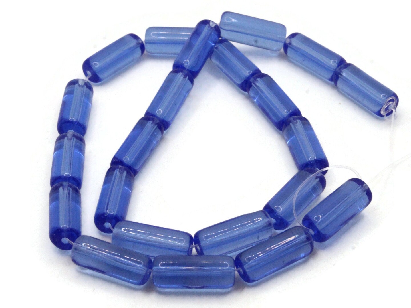 22 15mm Clear Blue Glass Tube Beads