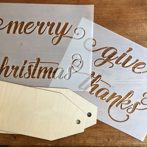 Merry Christmas &#x26; Give Thanks Stencil and Wood Tag Kit | 3790 by Designer Stencils | Word &#x26; Phrase Stencils | Reusable Art Craft Stencils for Painting on Walls, Canvas, Wood | Easy to Use &#x26; Clean Art Stencil