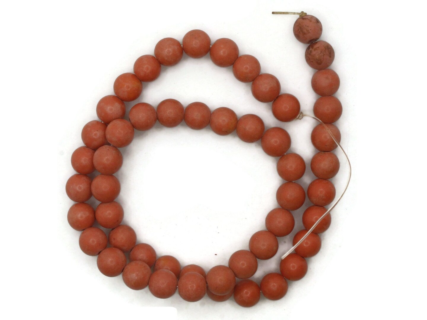 51 7mm to 8mm Round Dyed Orange Howlite Stone Beads