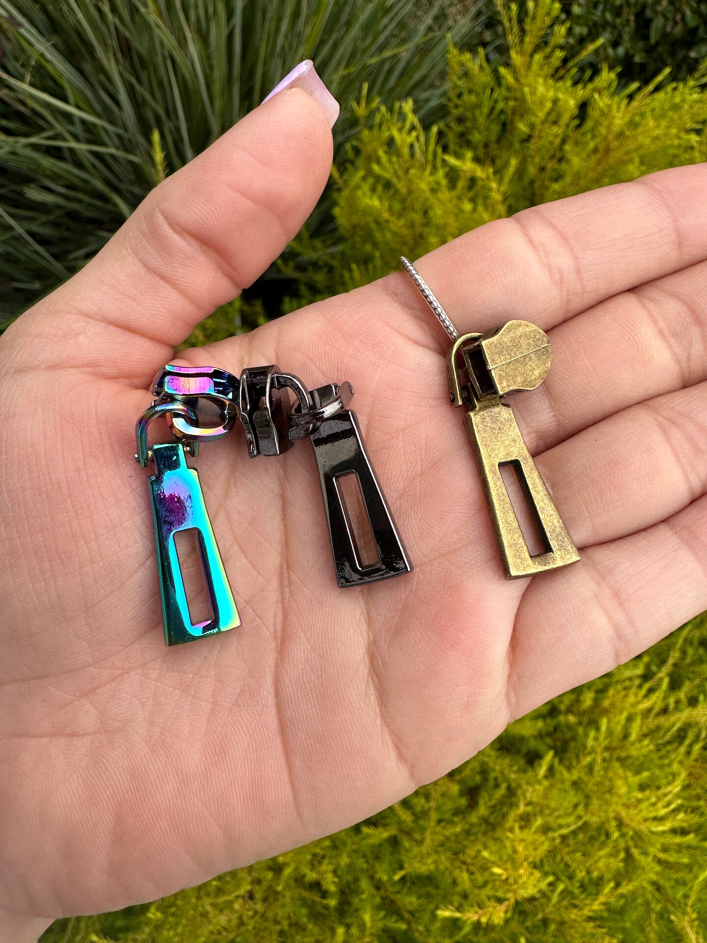 Triangular Link zipper pulls