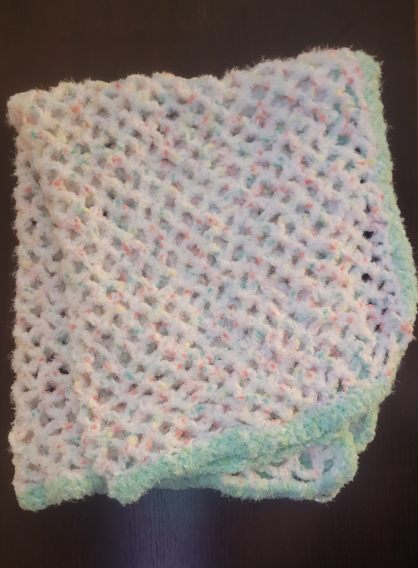 product name is Super Plush Crochet Baby Blanket