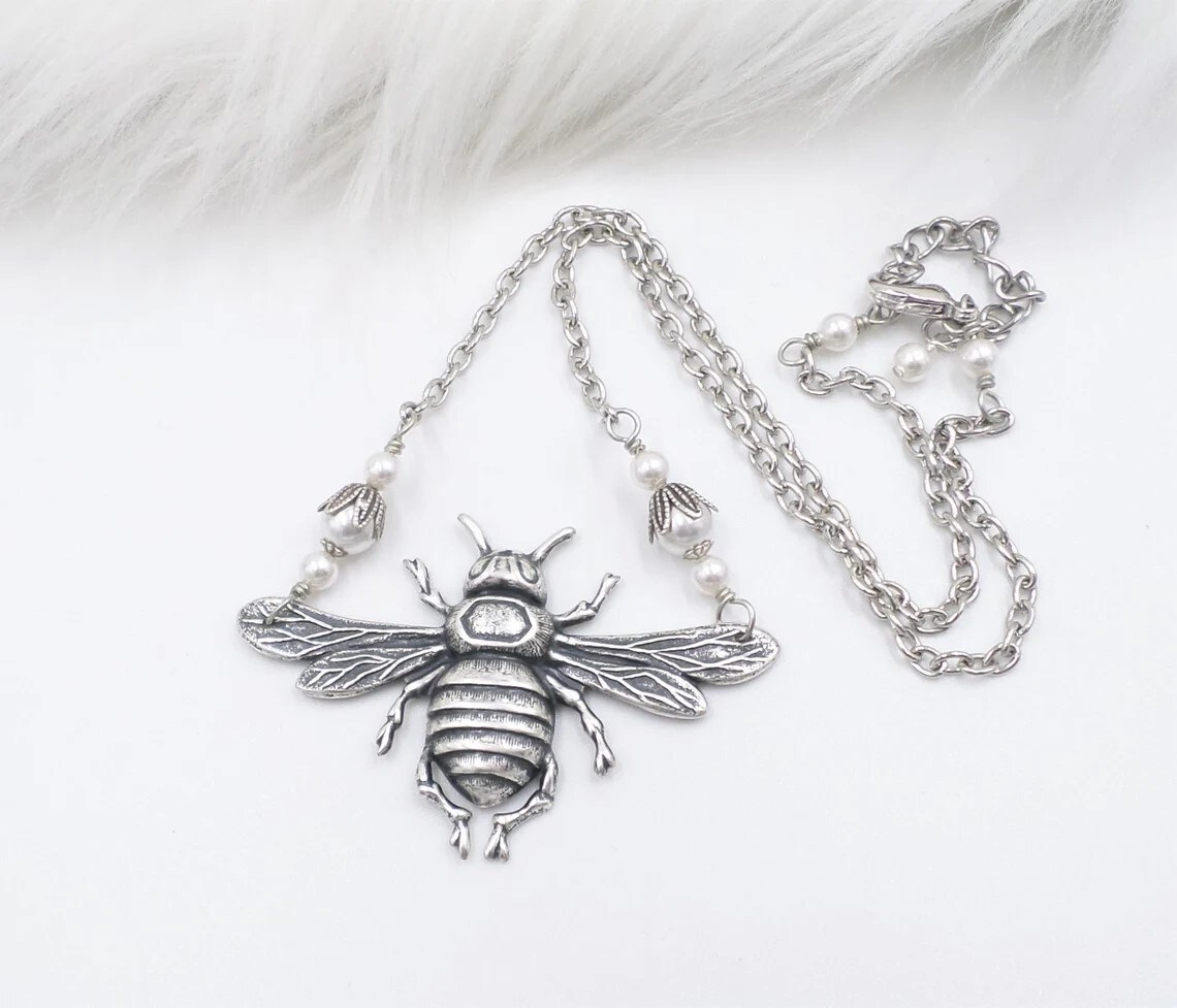 Amazon.com: Small Sterling Silver Bee Necklace, Save the Bee Activist  Jewelry, Honeybee and Bumble Bee Necklace, Minimal Bee Gift : Handmade  Products