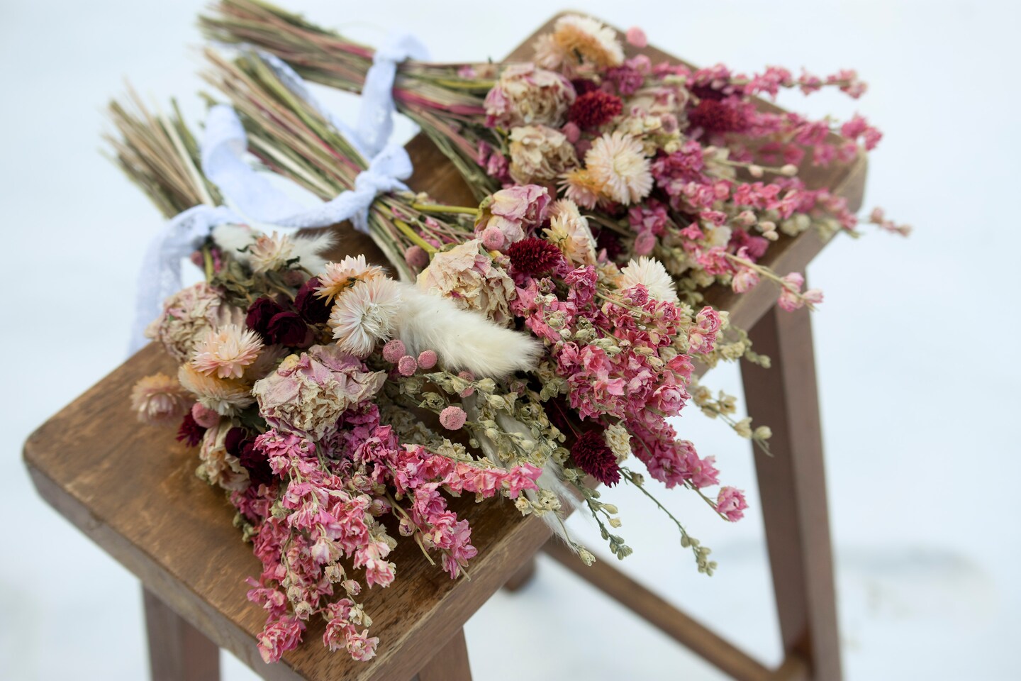 Pink and cream wildflower bouquet with peonies