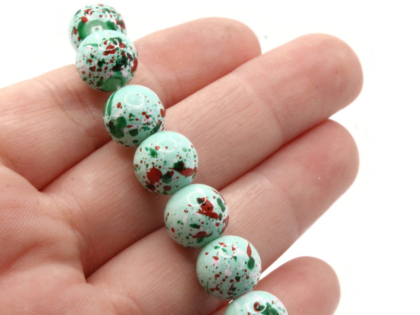 40 10mm Mint Green with Red &#x26; Pink Splatter Paint Smooth Round Glass Beads