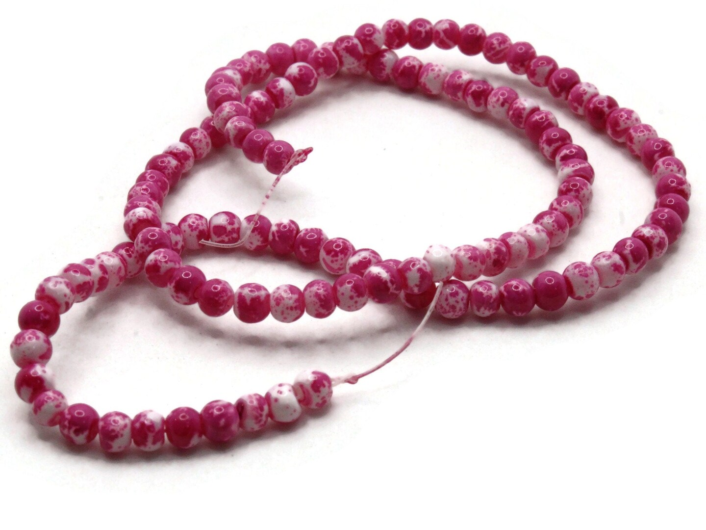 100 4mm White with Pink Splatter Paint Smooth Round Glass Beads