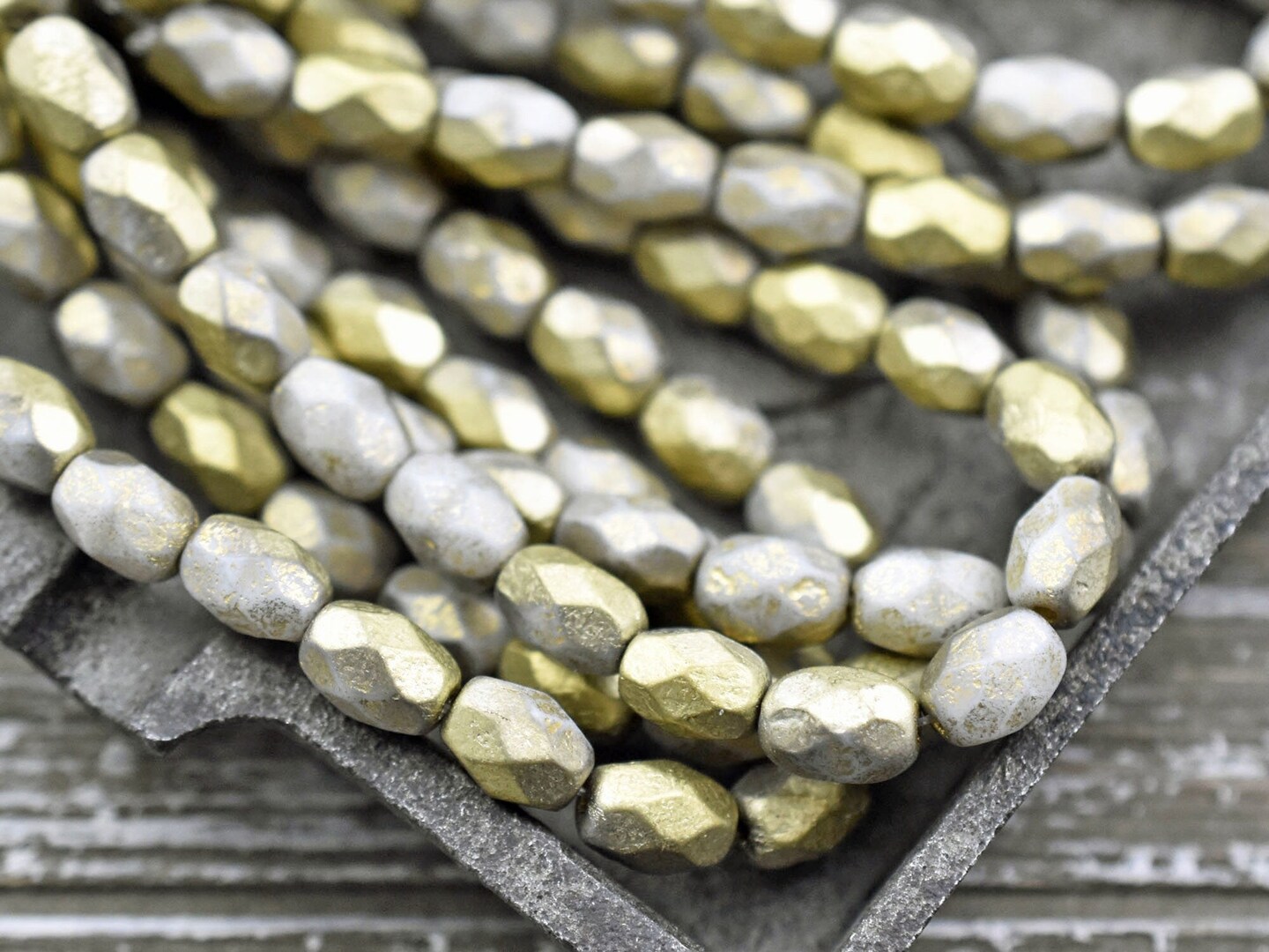 *20* 6x8mm Gold Washed Etched Ash Grey Faceted Oval Beads