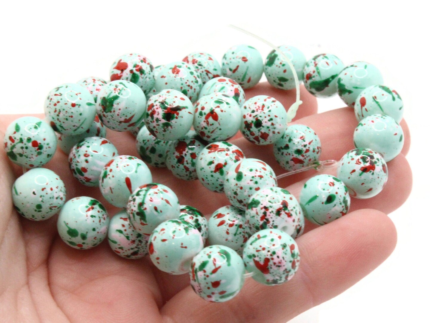 40 10mm Mint Green with Red &#x26; Pink Splatter Paint Smooth Round Glass Beads