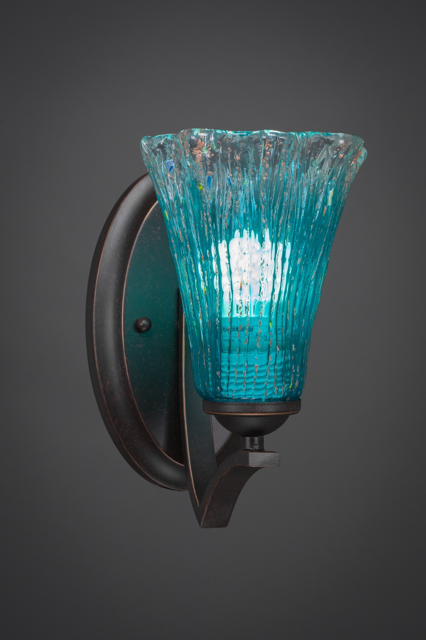 Zilo Wall Sconce Shown In Dark Granite Finish With 5.5 Teal Crystal Glass