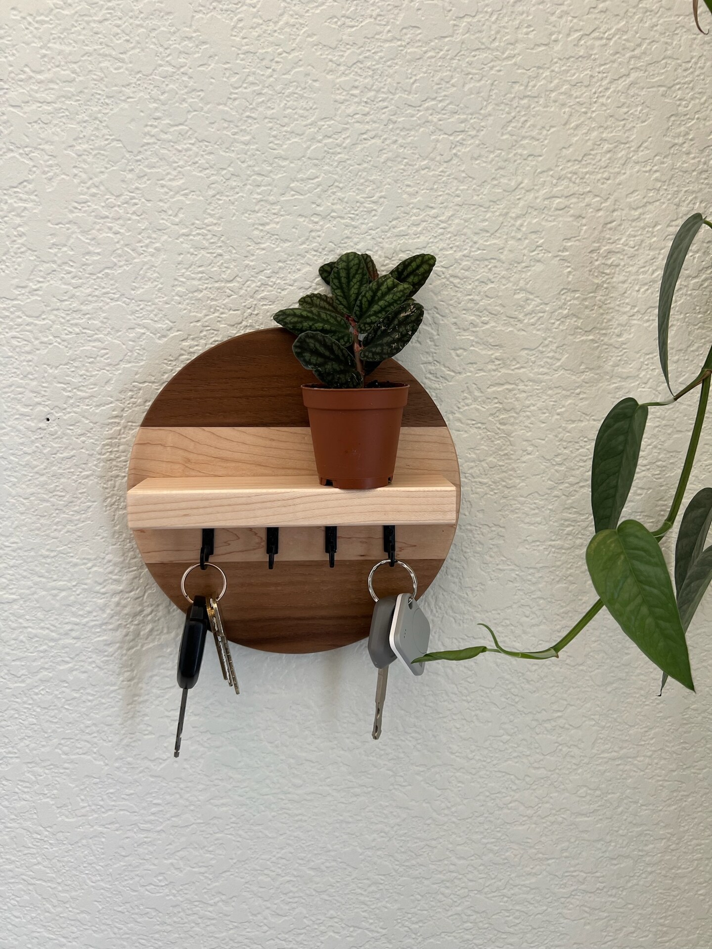 product name is Handmade Round Key Rack with Shelf, 4 Key Hooks, Natural and Solid Hardwoods, 7 inches, Entryway Organizer, Key Holder, Wallet Holder
