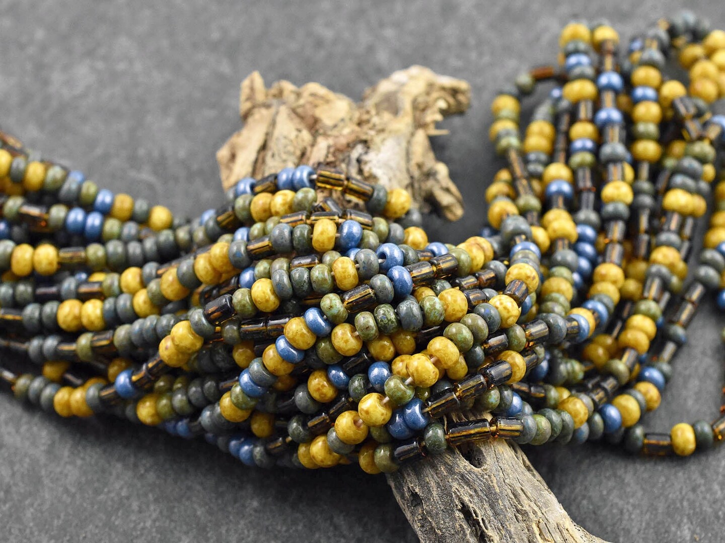 4/0 Aged Winterfell Striped Picasso Seed Bead Tube Mix (19" Strand)