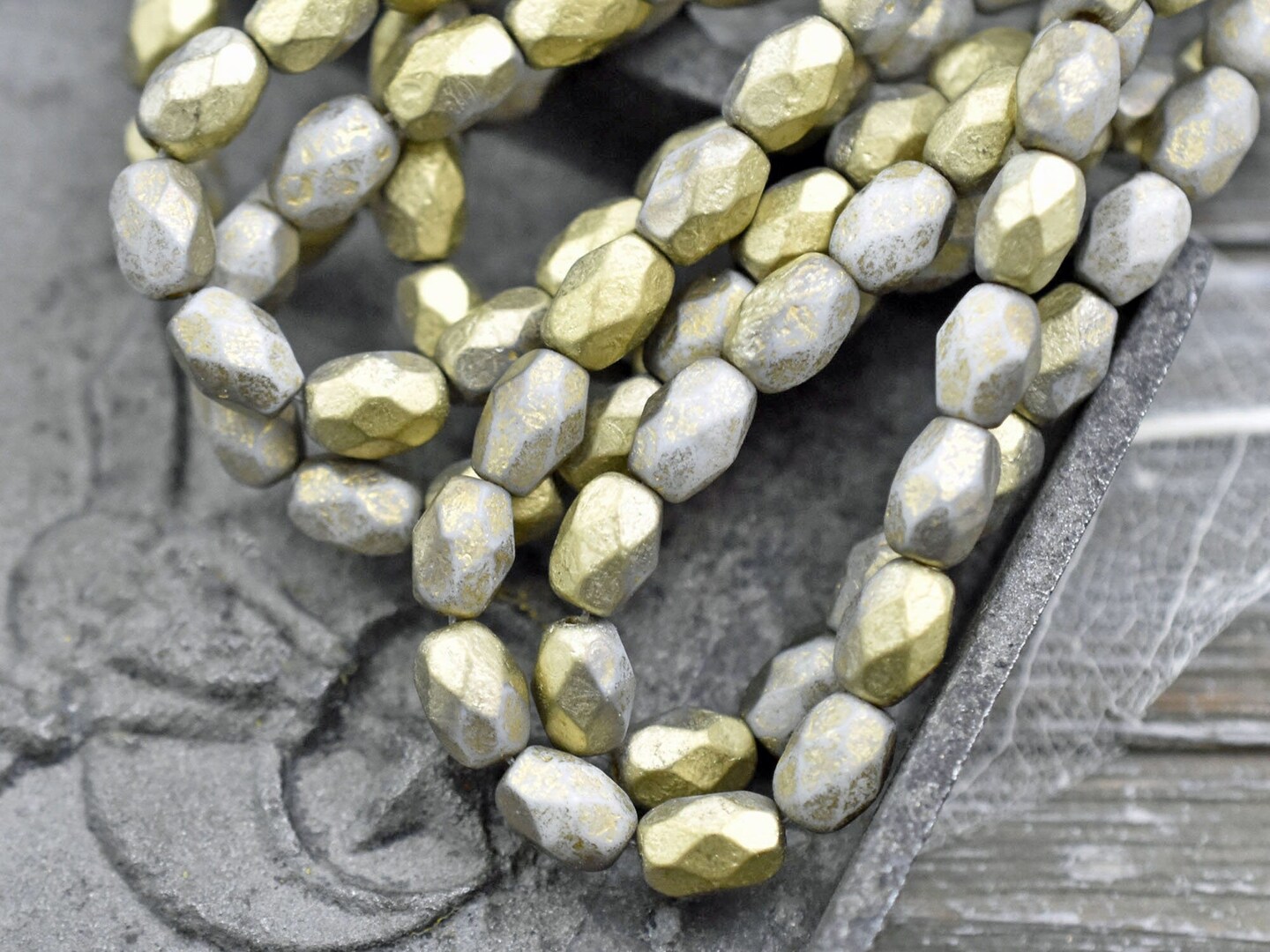 *20* 6x8mm Gold Washed Etched Ash Grey Faceted Oval Beads