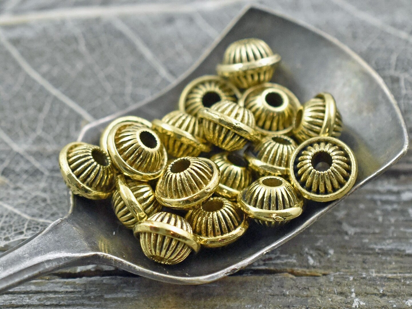 *25* 5x7mm Antique Gold Bicone Spacer Beads