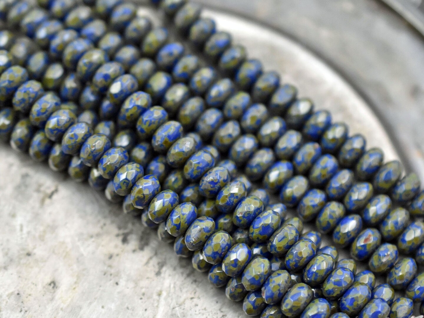 *21* 5x7mm Opaque Cobalt Travertine Fire Polished Rondelle Beads