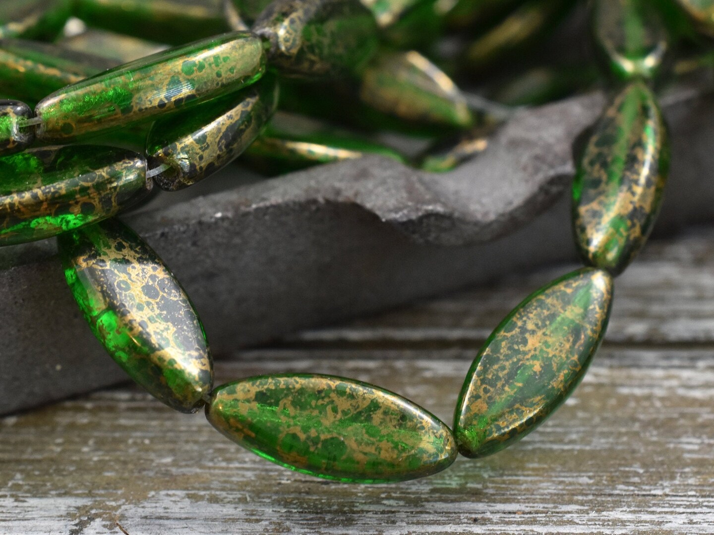 *10* 18x7mm Gold Washed Emerald Green Spindle Beads