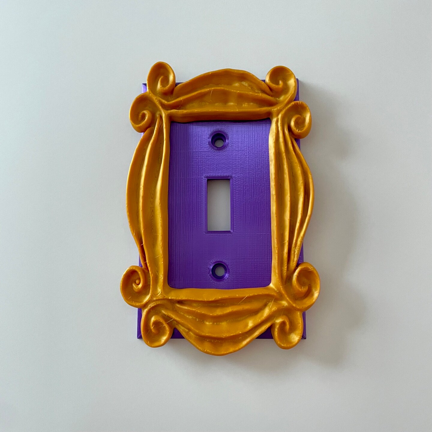 Friends' Inspired Peephole Frame Light Switch Cover - Monica's