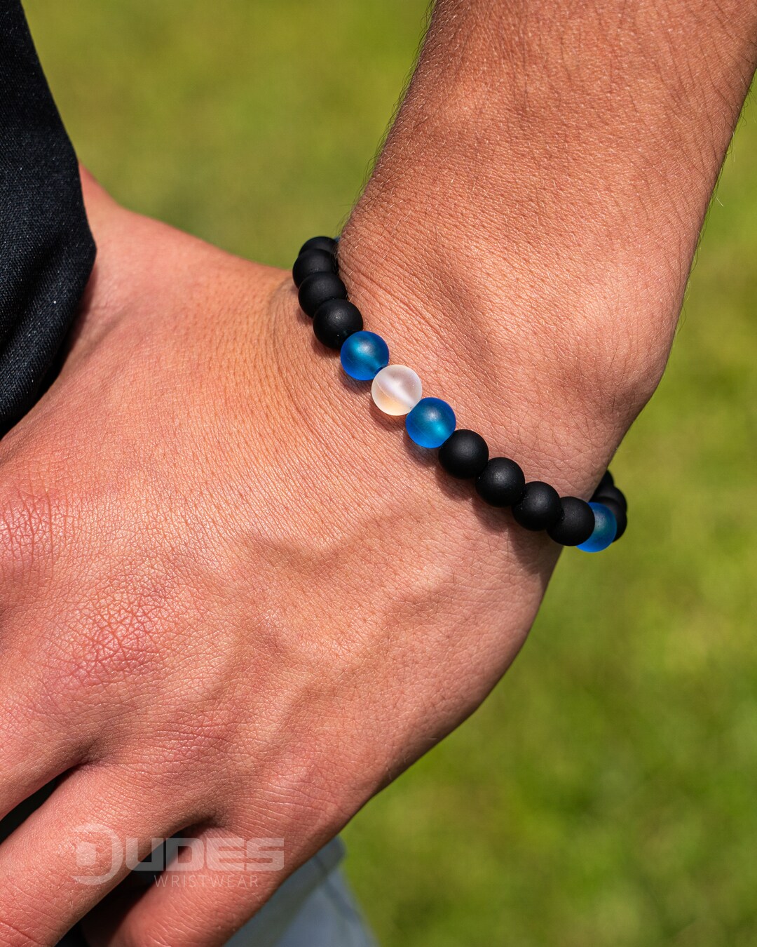 Men Beaded Bracelet | Black Silicone, Blue Translucent and White Beads |  Handmade Minimalist Stretch Bracelet | MakerPlace by Michaels, image size:864x1080