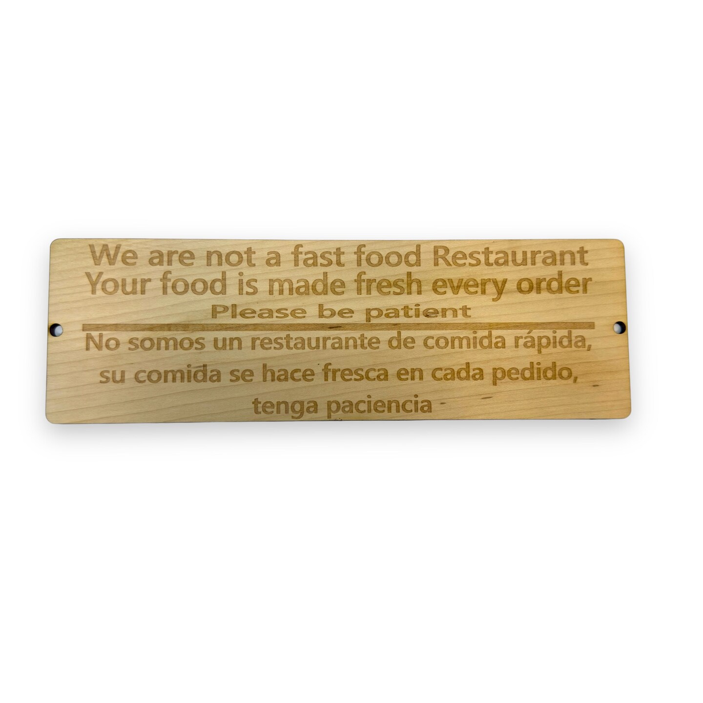 Sign - English &#x26; Spanish - We are not a fast food restaurant Please Be Patient