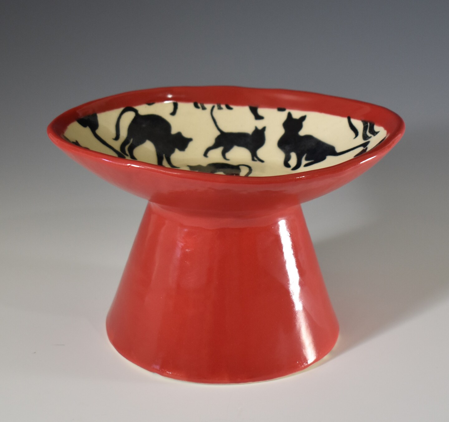 product name is Ceramic Pedestal Cat Food Bowl