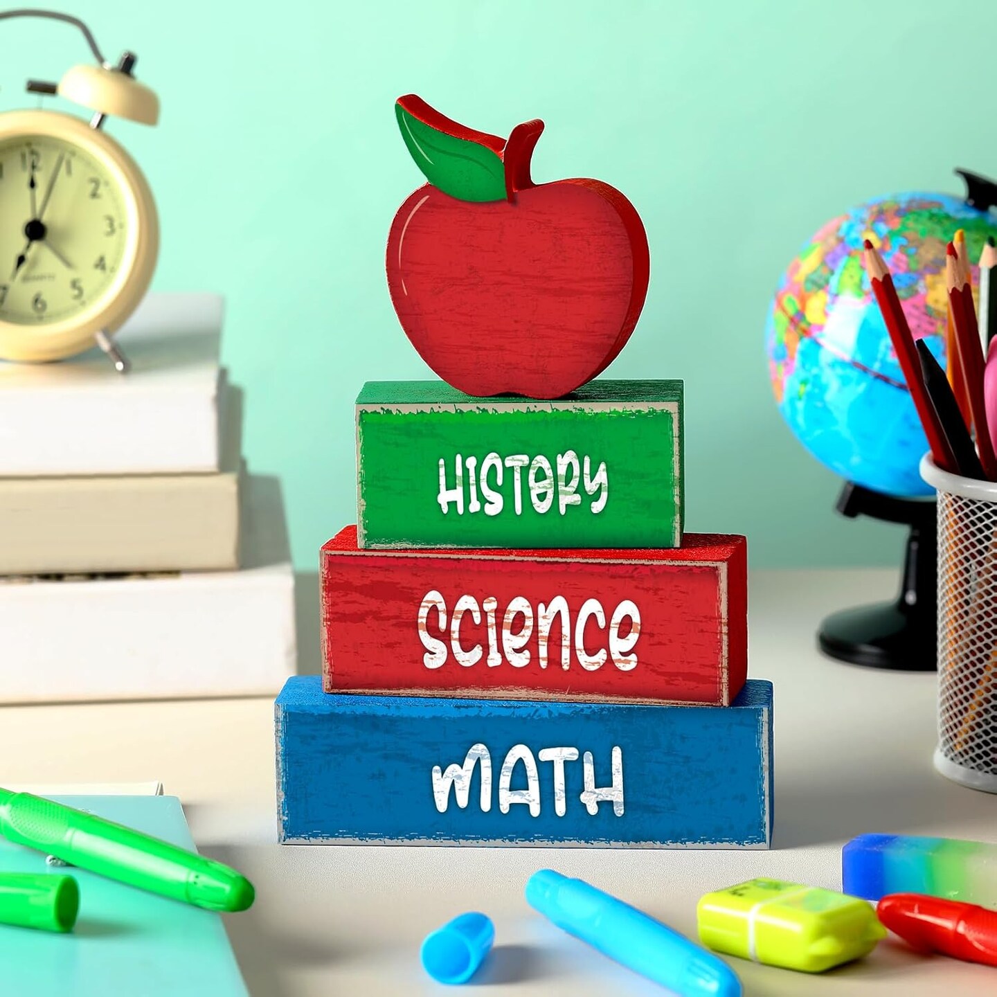 Back-to-school decorations with bus, apple, and rustic wood block sign for tiered tray or mantel.