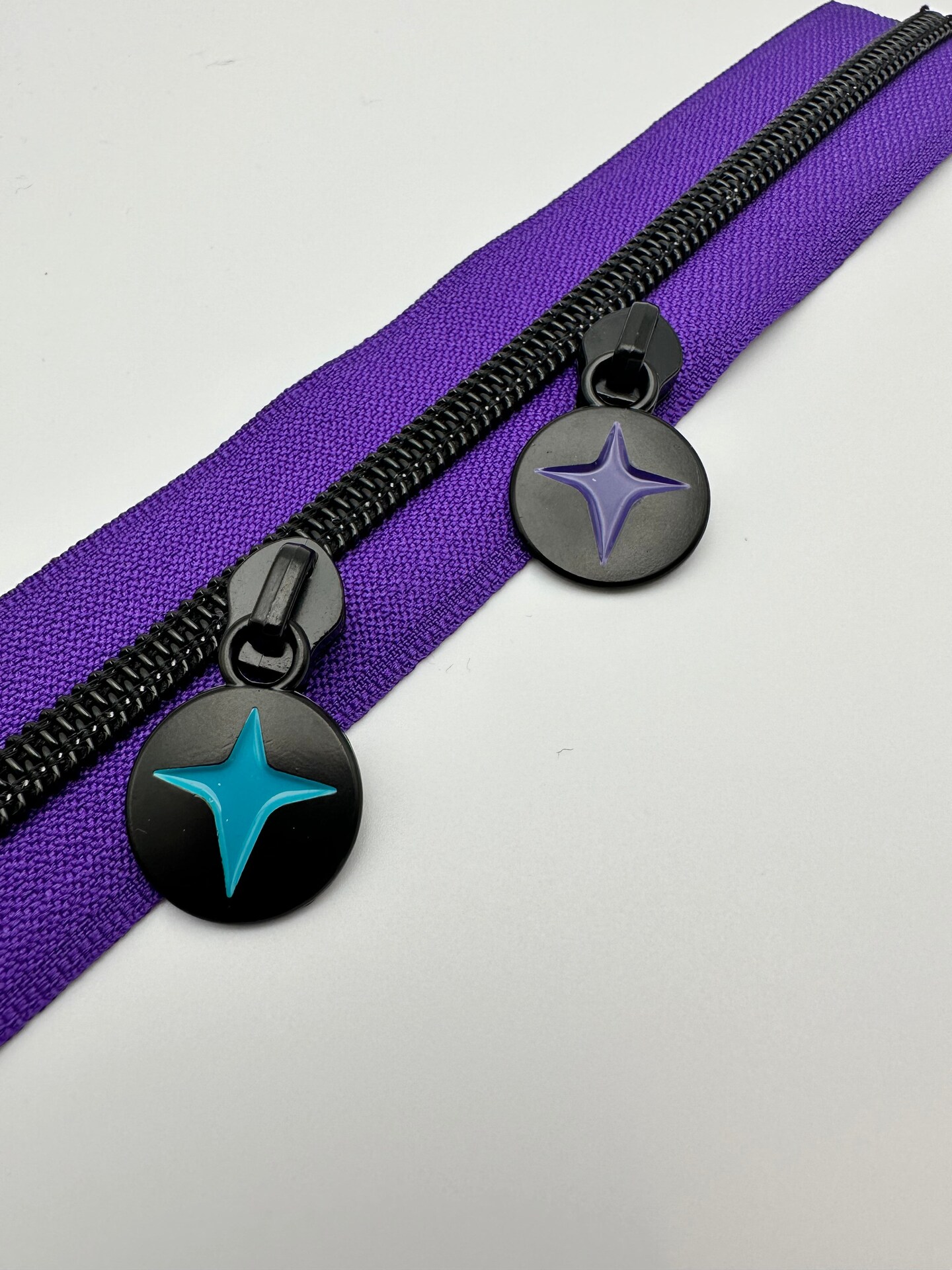 Matte Black Enamel Starburst zipper pulls