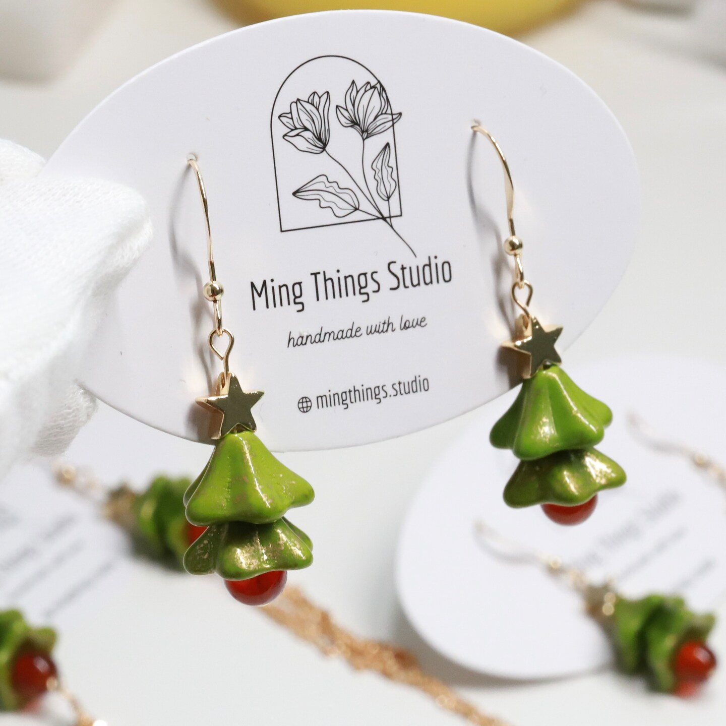 Engraved Christmas Tree Dangle Earrings in Green and White Acrylic