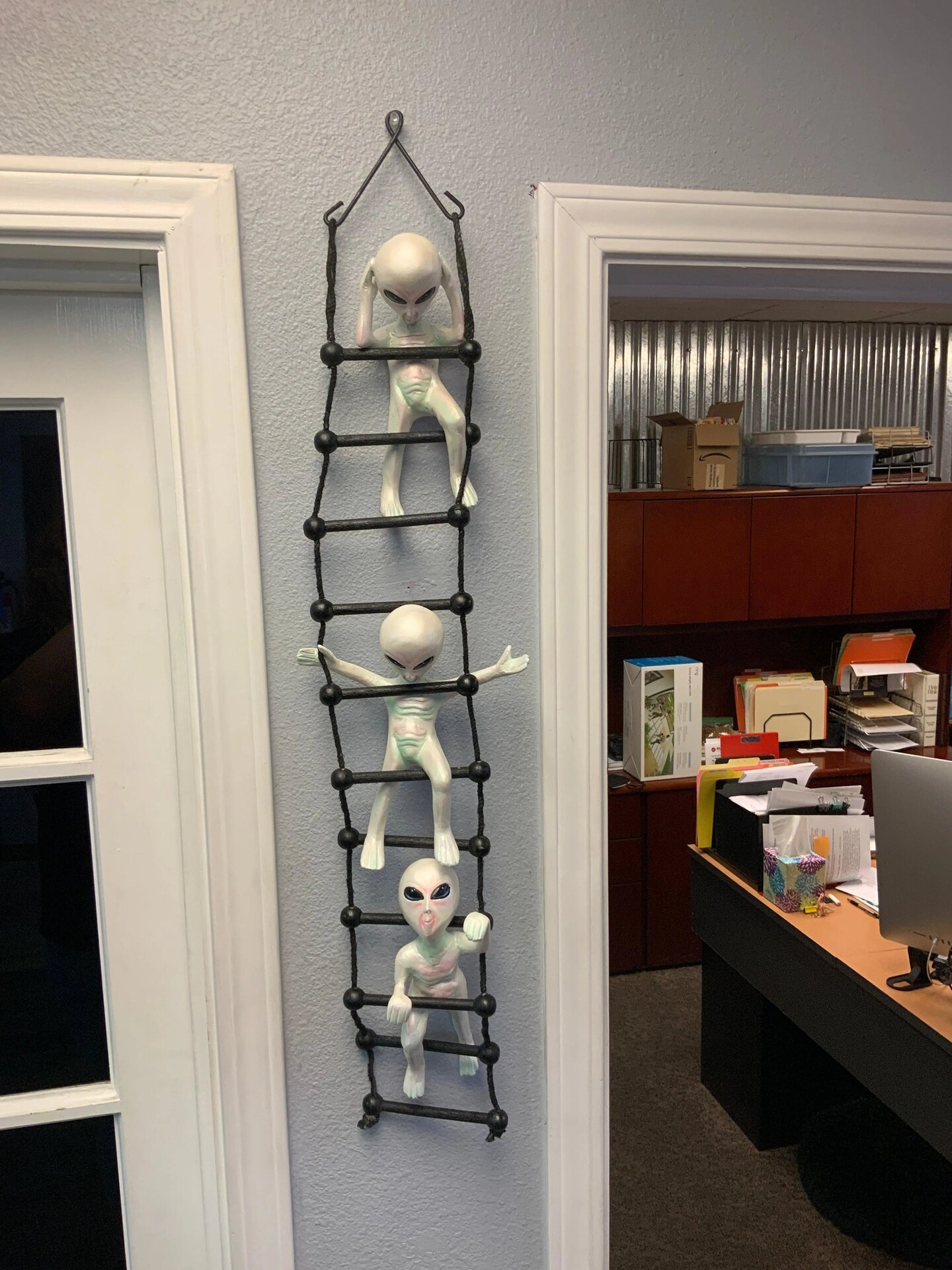 Aliens on Rope Ladder Statue