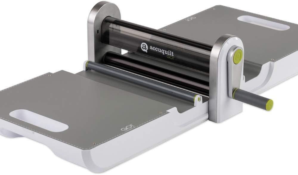 AccuQuilt GO! Fabric Cutter Starter Set including the GO! Fabric Cutter, GO! Value Fabric Cutting Die, GO! 6&#x201D; x 12&#x201D; Cutting Mat, 20 Pg Pattern Book, and Die Pick.