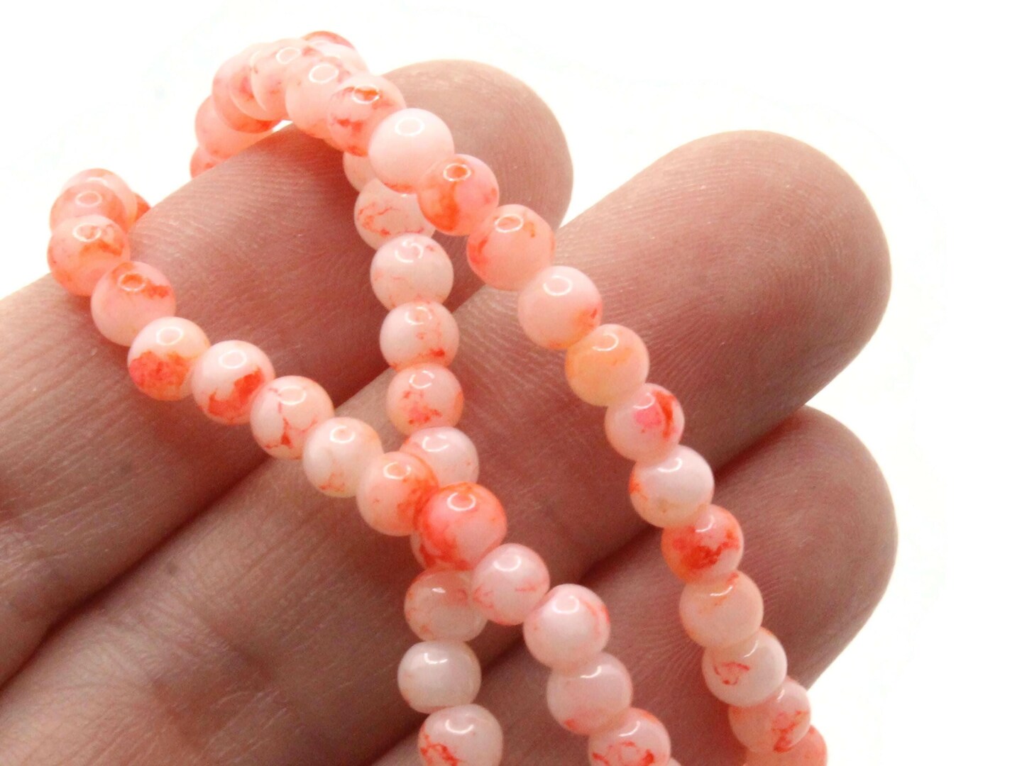 100 4mm White with Orange Splatter Paint Smooth Round Glass Beads