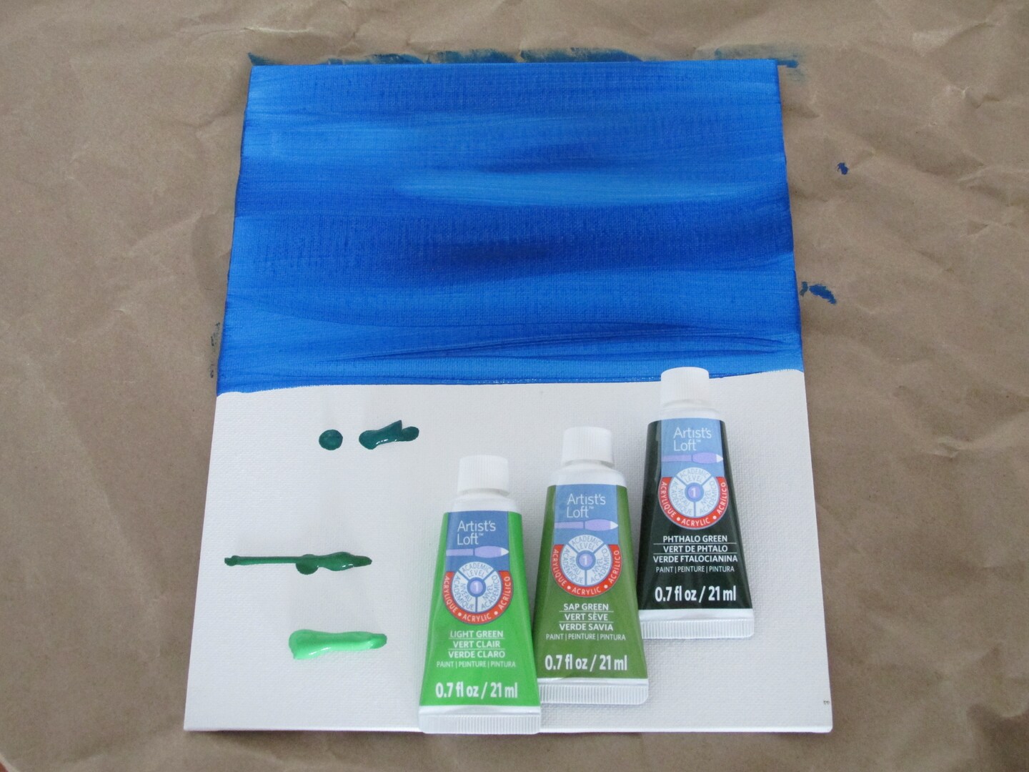 Paint flowers in grass with acrylic paint. image 3