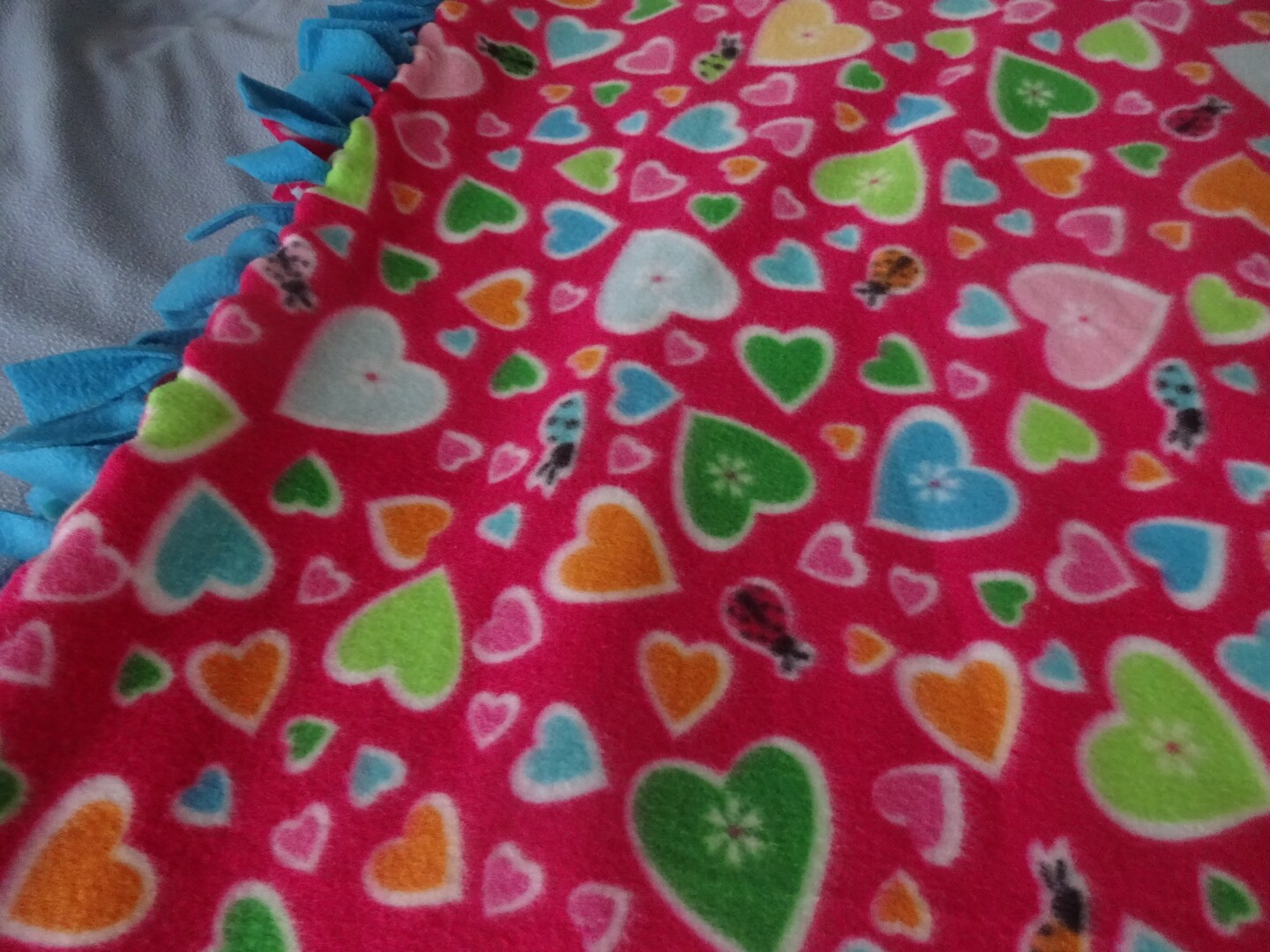 Colorful HEARTS on HOT PINK Handmade Fleece Blanket BLUE Back Comfy  MakerPlace by Michaels