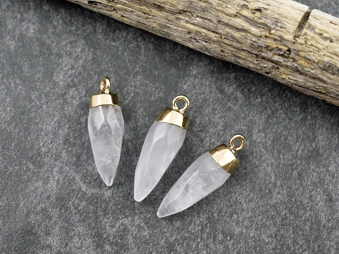 25-26mm Gold Tone Natural Quartz Crystal Pointed Bullet Pendant | Michaels
