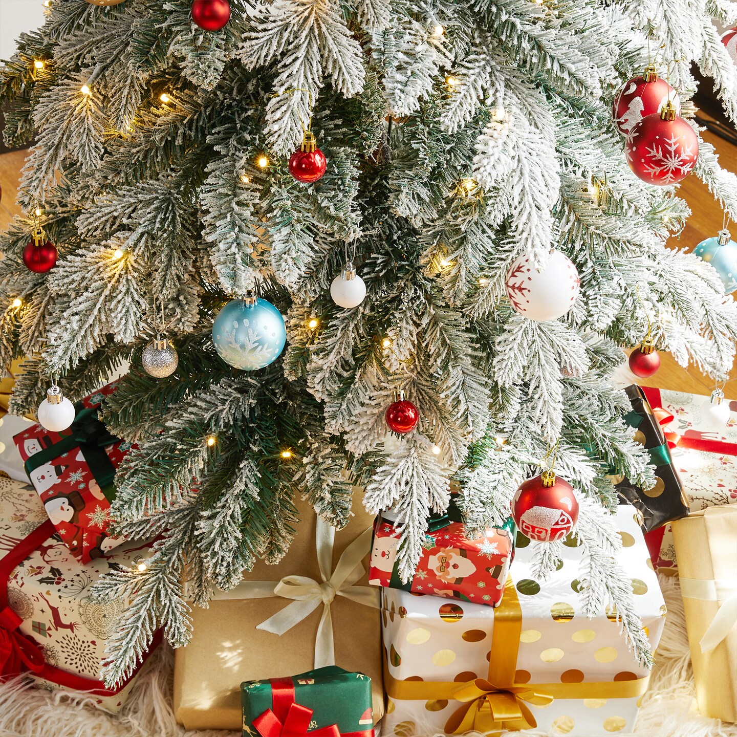 9ft Pre-Lit Flocked Pencil Spruce Artificial Christmas Tree with 470 Warm White Lights