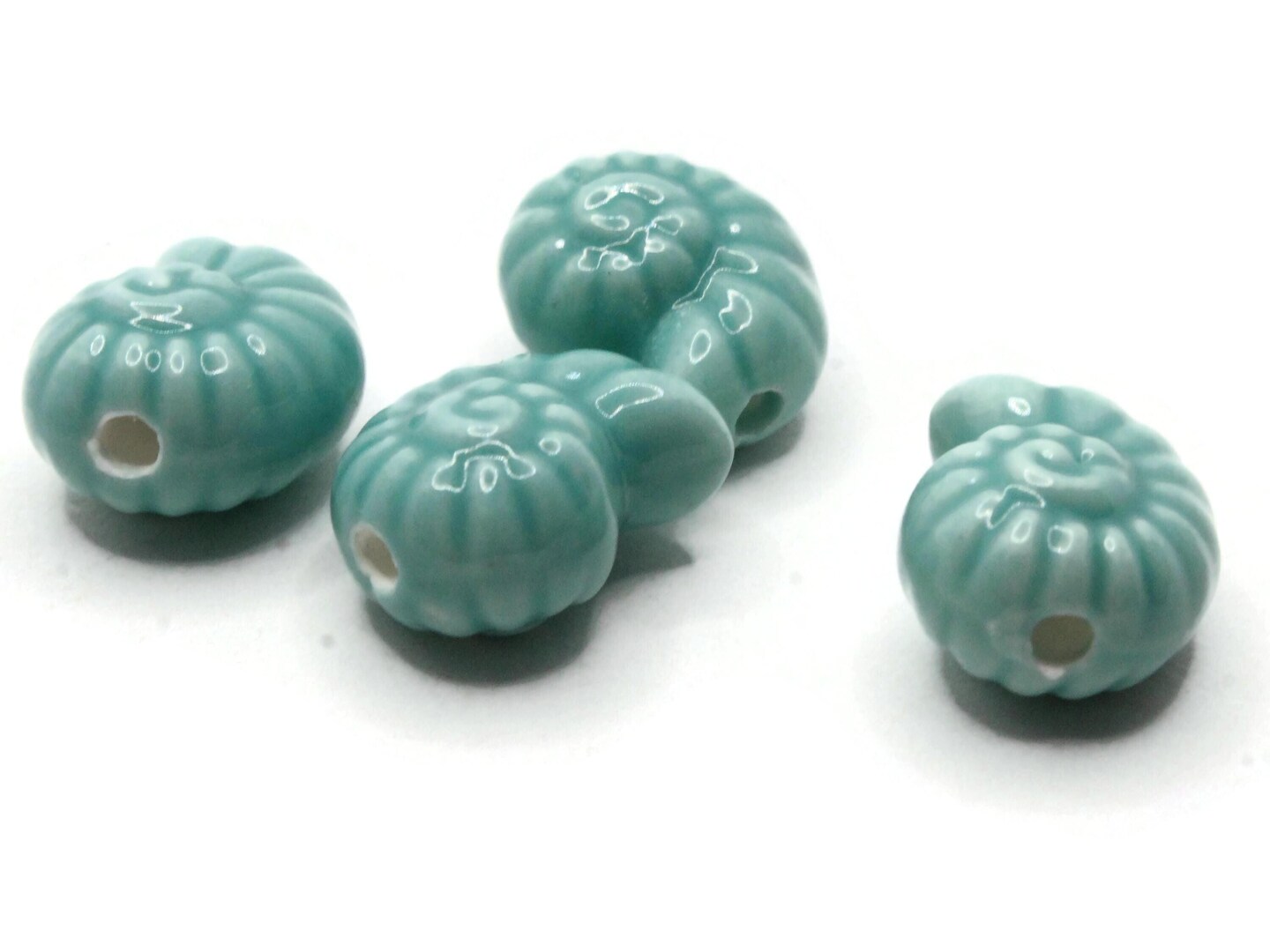 4 14mm Teal Green Porcelain Spiral Seashell Beads