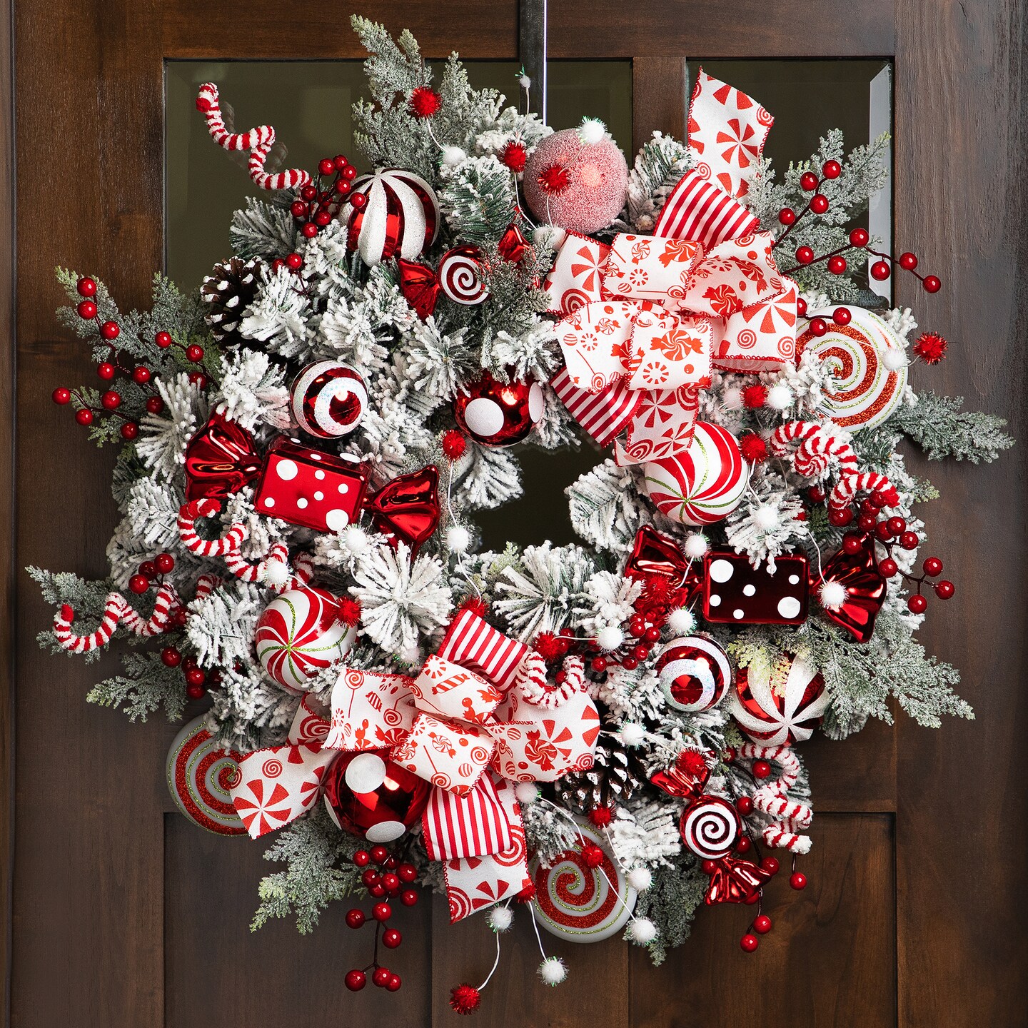 Northlight Heavily Flocked Pine with Candy Cane Striped Ornaments Christmas Wreath - 28&#x22; - Unlit
