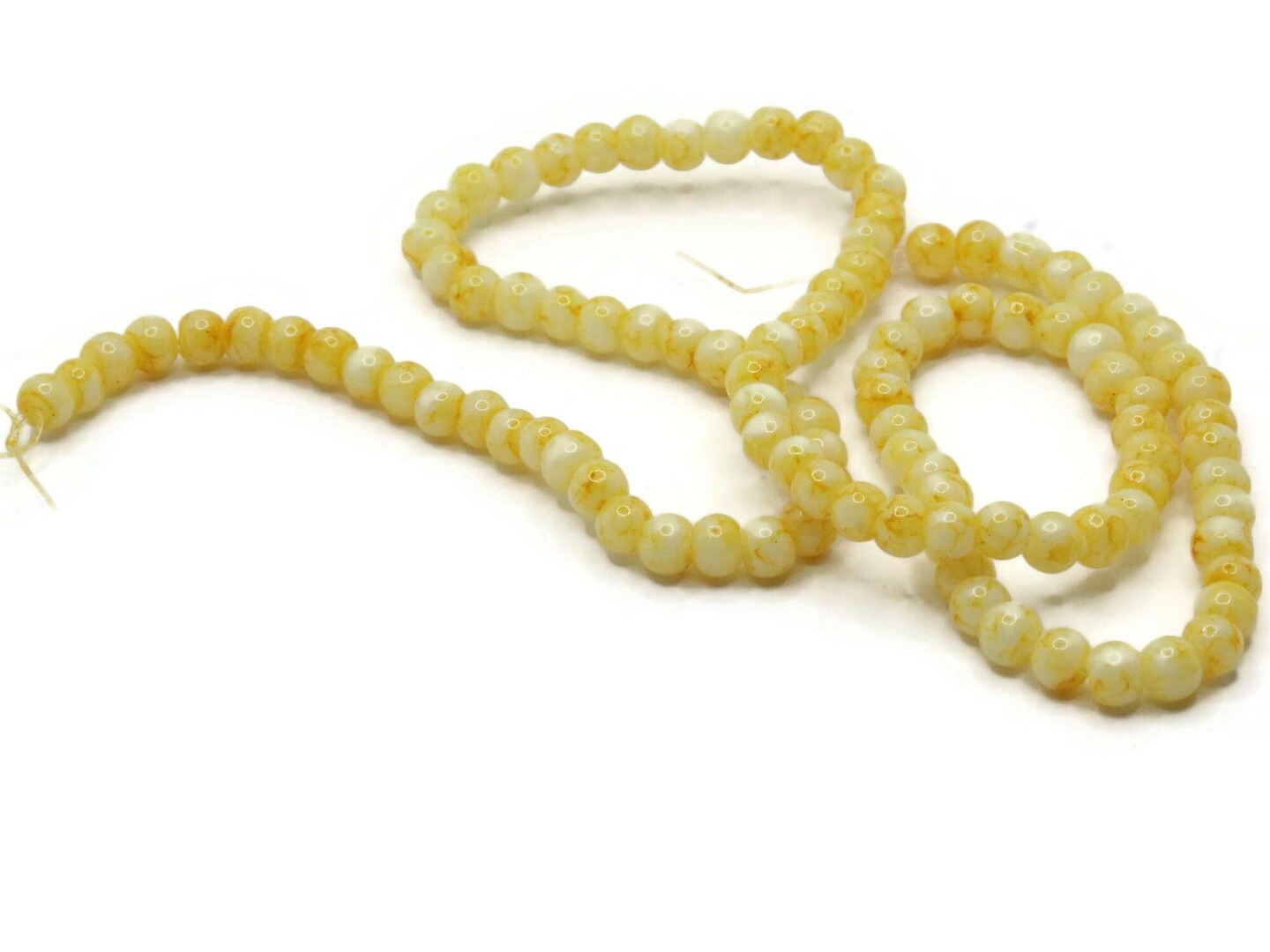 100 4mm White with Yellow Splatter Paint Smooth Round Glass Beads