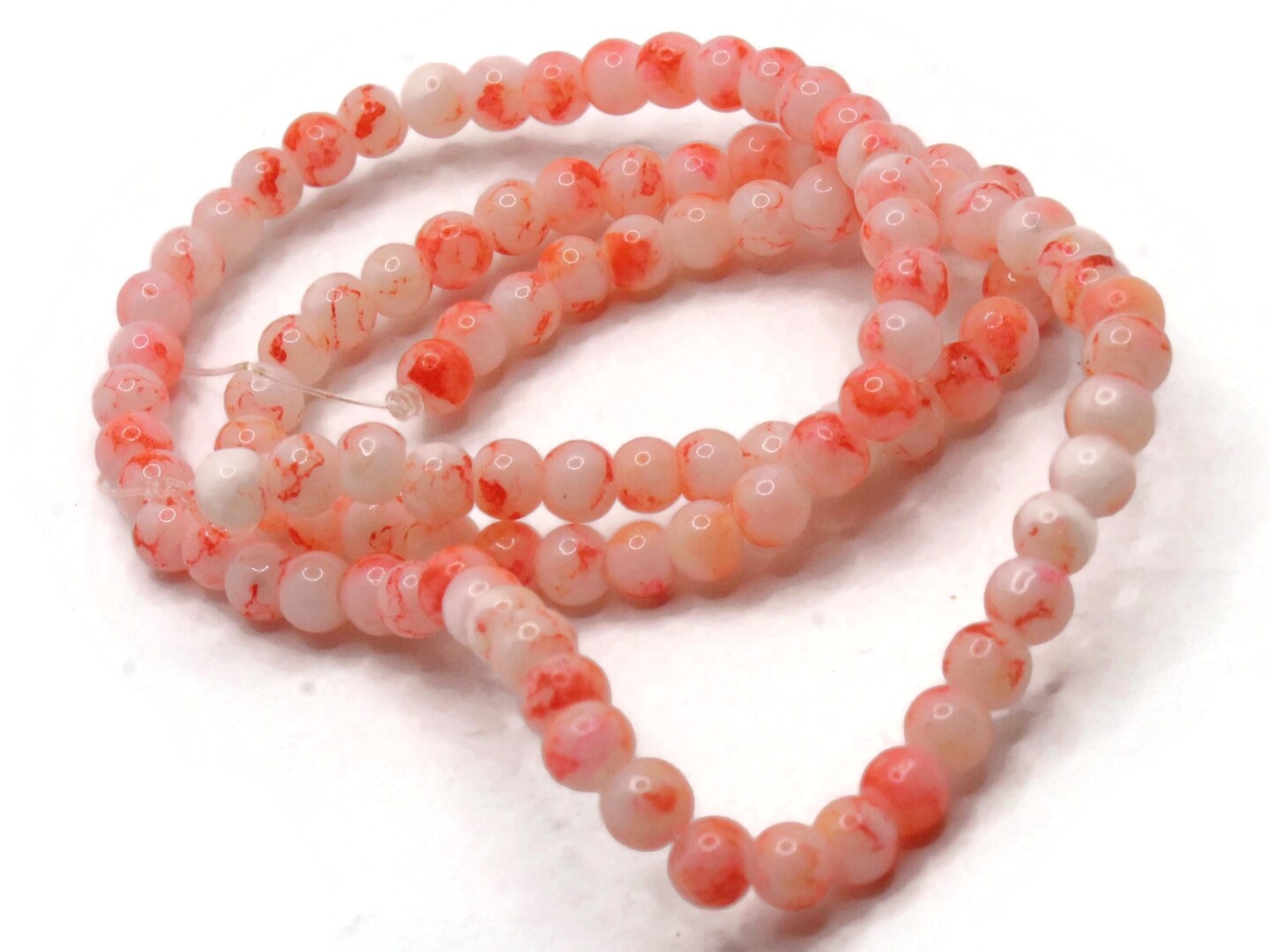 100 4mm White with Orange Splatter Paint Smooth Round Glass Beads
