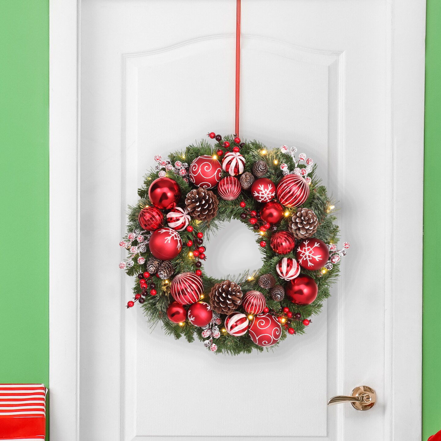 Haute Decor 26 Inch Holiday Times Wreath with Soft White LED Lights and Automatic Timer - Christmas Wreath with Patterned Red and White Shatterproof Ornaments, Berries, and Real Pinecones…