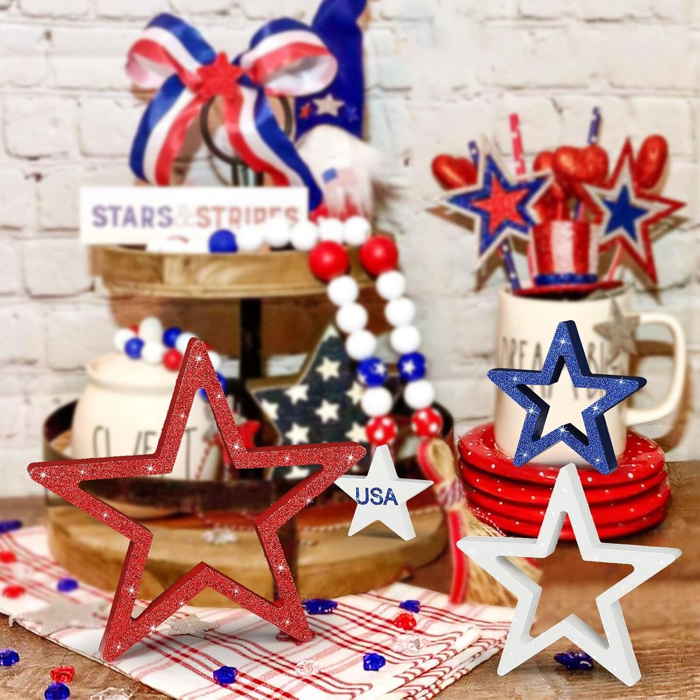 Set of 4 glittery red, white, and blue stars for 4th of July decor.