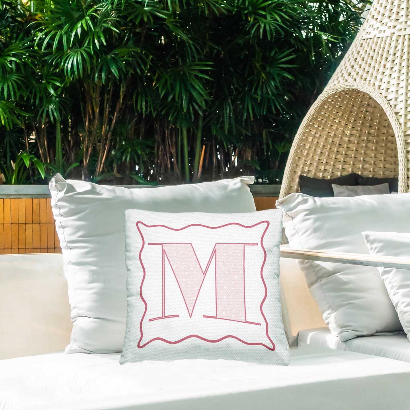 Stupell Industries Patterned Pink M Letter Outdoor Pillow, 18 x 7 x 18